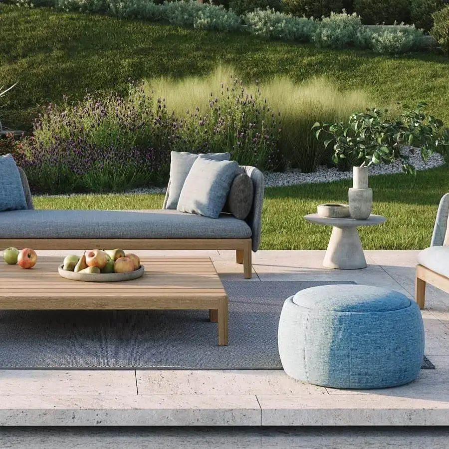 Innovative Royal Botania Tono ottoman with light blue textured textile finish offering storage or planter function