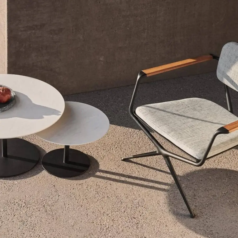 Elegant Royal Botania Butler side table with layered effect and matte black coated stainless steel base