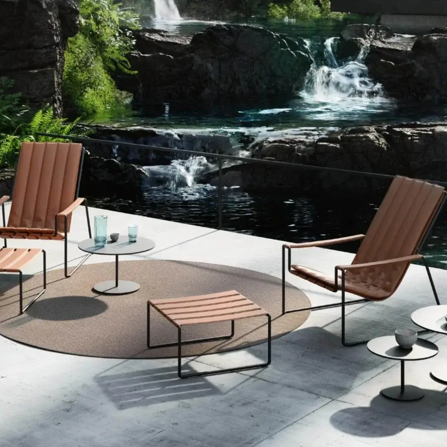 Elegant Royal Botania Butler side table with smooth gray enameled lava stone and coated stainless steel construction