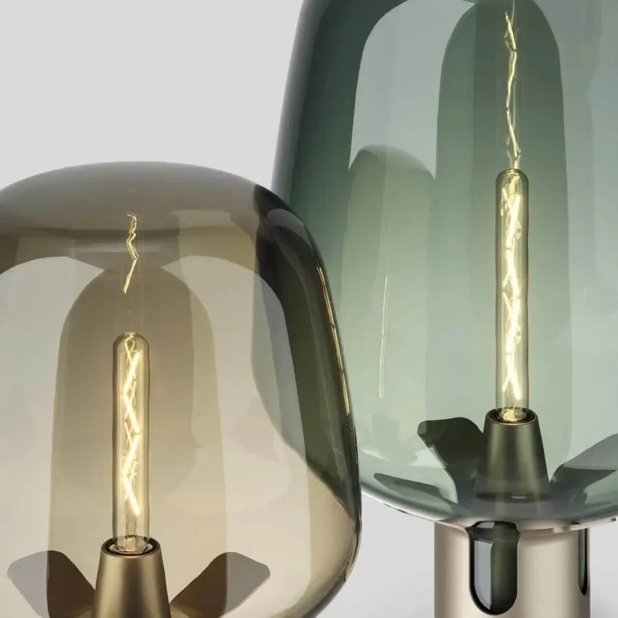 Exceptional Lodes Flar floor lamp crafted in Italy with muted green blown glass and metal structure