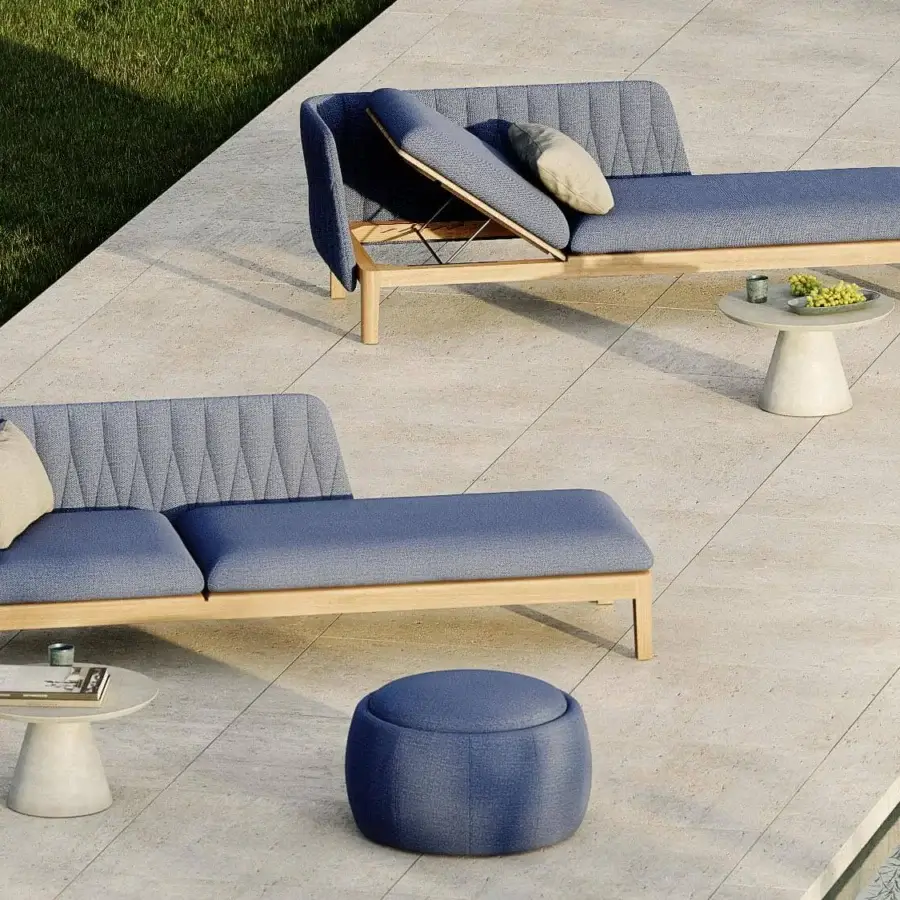 Superior Royal Botania Calypso lounge lounger with a reclining teak base and textured blue textile upholstery with stainless steel accents