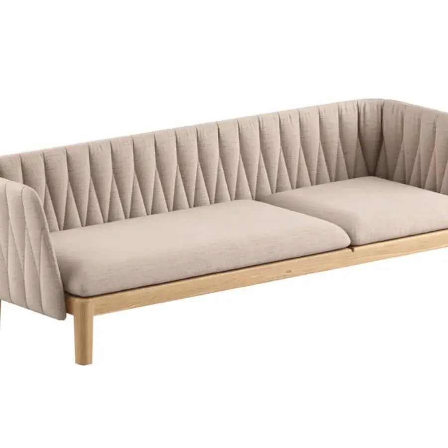 Sophisticated Royal Botania Calypso lounge lounger with light beige upholstery, reclining teak base and channeled stainless steel backrest
