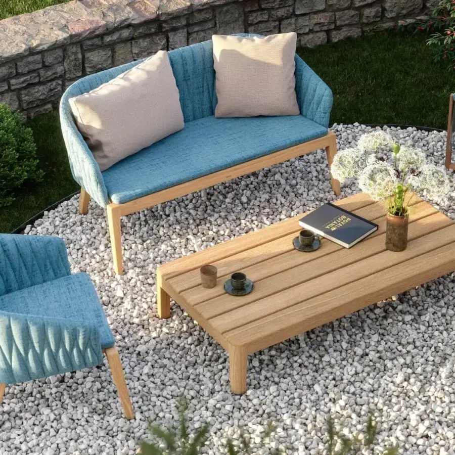 Distinguished Royal Botania Calypso lounge coffee table crafted in teak wood with a contemporary warm brown finish
