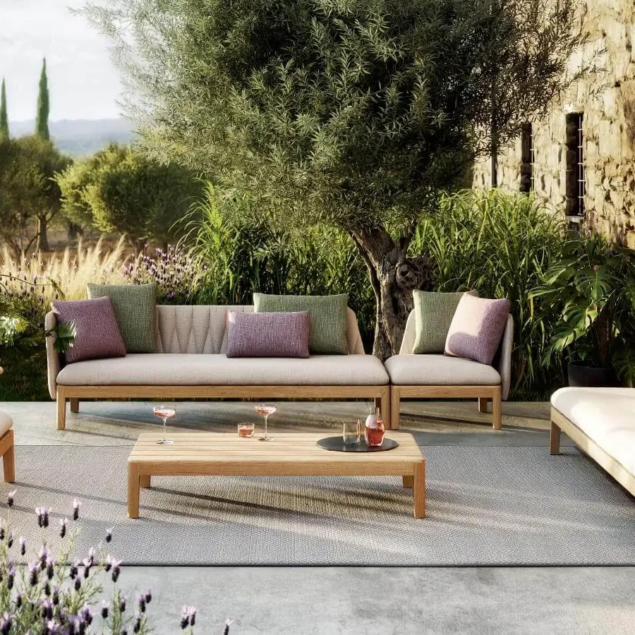 Elegant Royal Botania Calypso lounge coffee table crafted in teak wood with a natural tone and matte finish