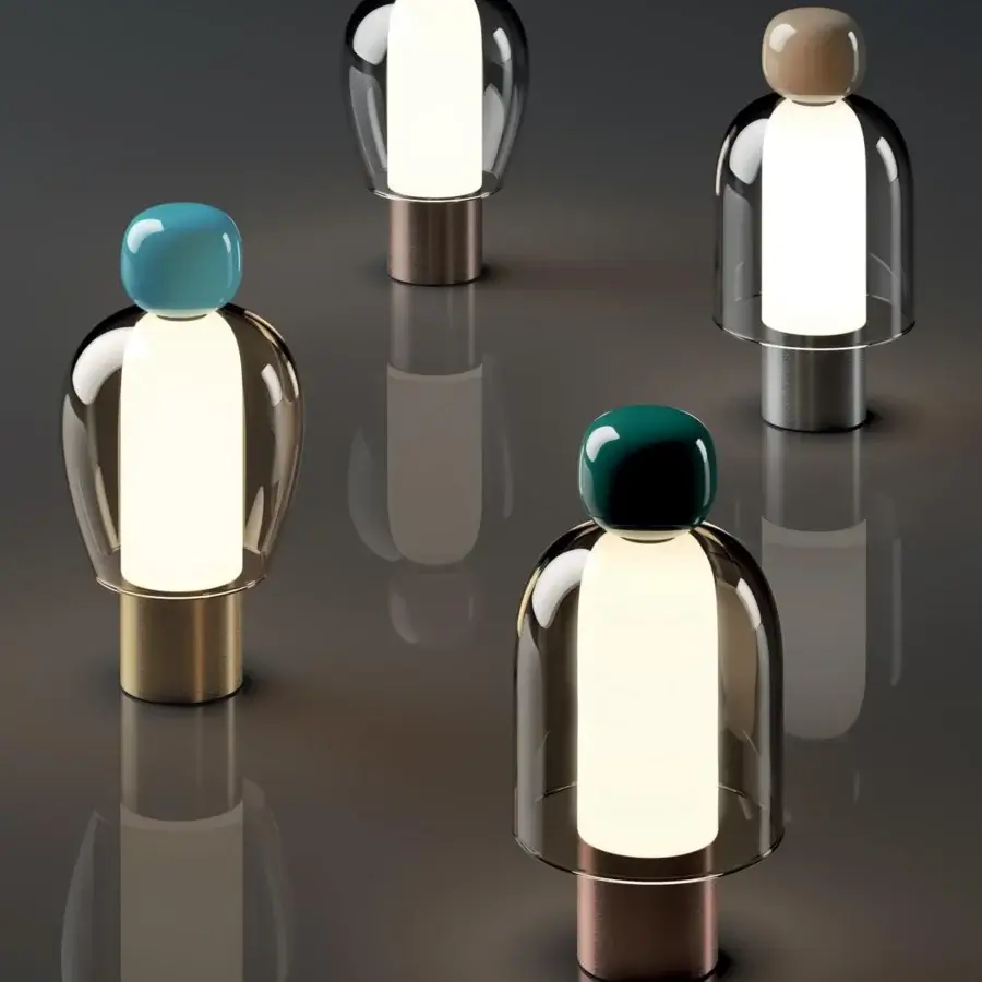 Exclusive Lodes Easy Peasy table lamp with a sculptural rounded shade in glossy teal glass and a refined silver metal base