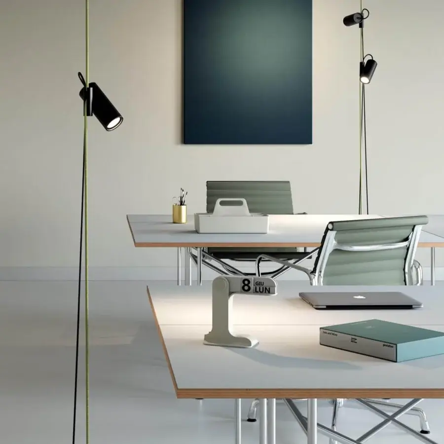 Distinguished Lodes Cima floor lamp with a sleek black metal structure and vibrant green and black rope accents