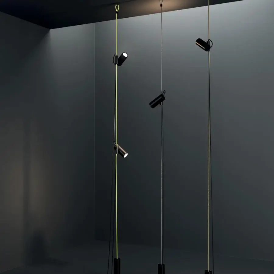Elegant Lodes Cima floor lamp with a cylindrical spotlight and black metal structure inspired by nautical design