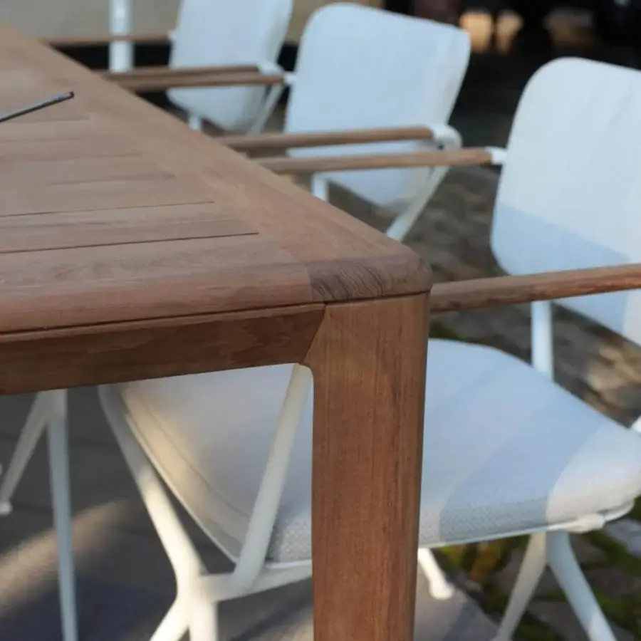 Superior Royal Botania U-nite table built in teak with a warm brown hue and smooth matte finish