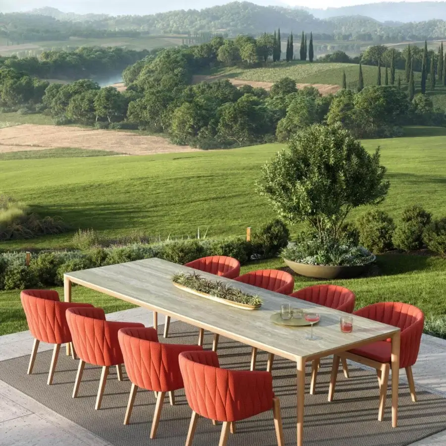 Exceptional Royal Botania U-nite table with light-toned teak and smooth matte finish supported by slender legs