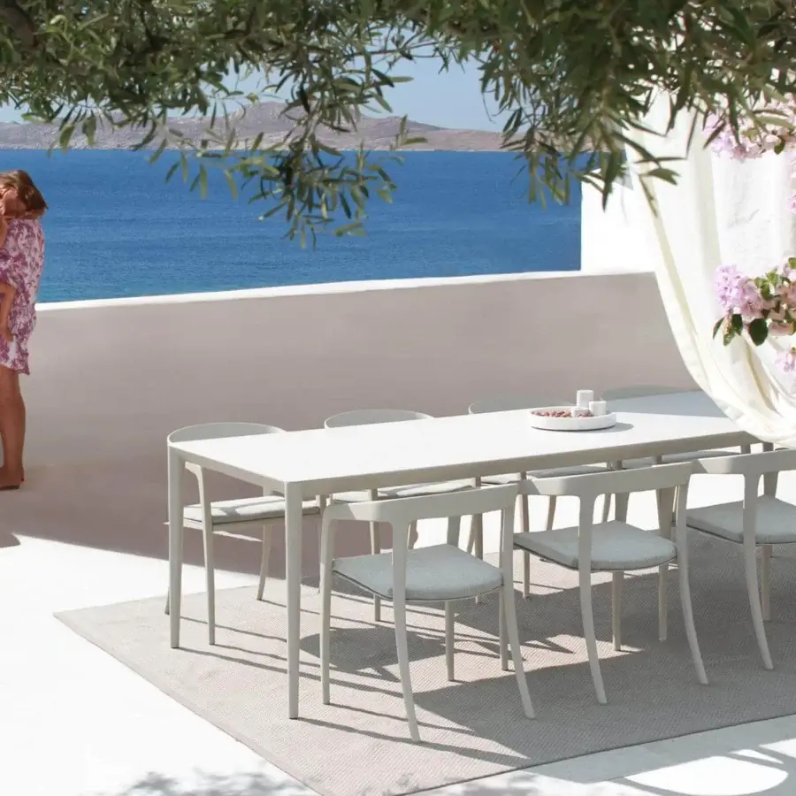 Distinguished Royal Botania U-nite table crafted in light gray teak with a matte finish for sophisticated outdoor spaces