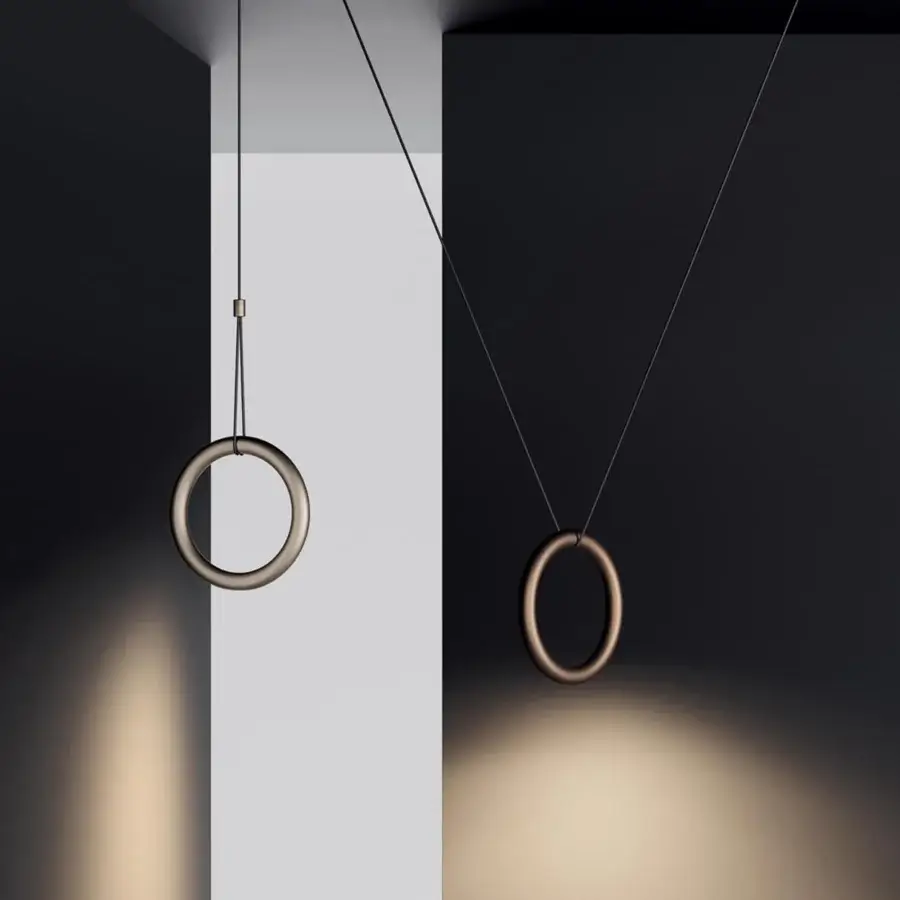 Elegant Lodes IVY V suspension lamp crafted in bronze with a matte finish illuminating surfaces below with delicate cables