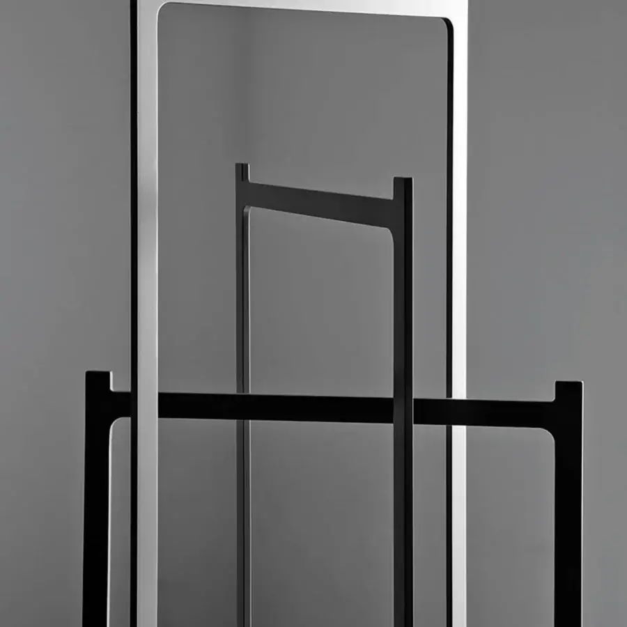 Distinguished Sovet Italia Clip coat stand crafted in laser-cut welded metal with a light gray matte finish