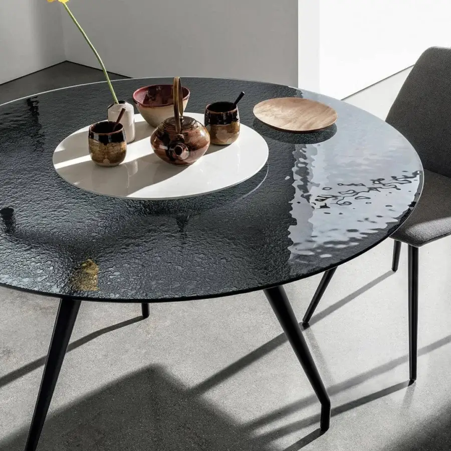 Exceptional Sovet Italia Arkos table with dark grey rippled glass top and sleek matte black metal base built with angled legs