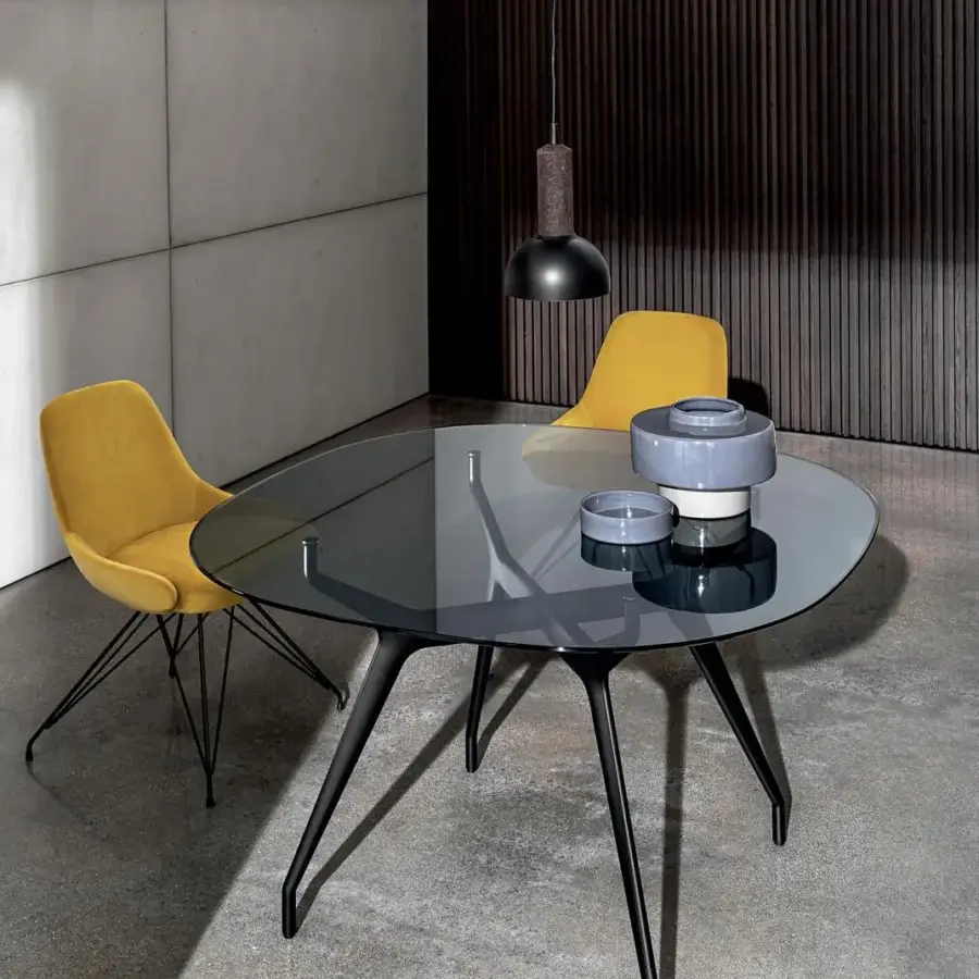 Elegant Sovet Italia Arkos table with rounded square smoked glass top and dark matte die-cast aluminum X legs