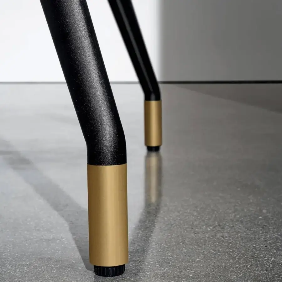 Distinguished Sovet Italia Arkos table with a refined square top and slender matte black X legs with gold metallic sleeves