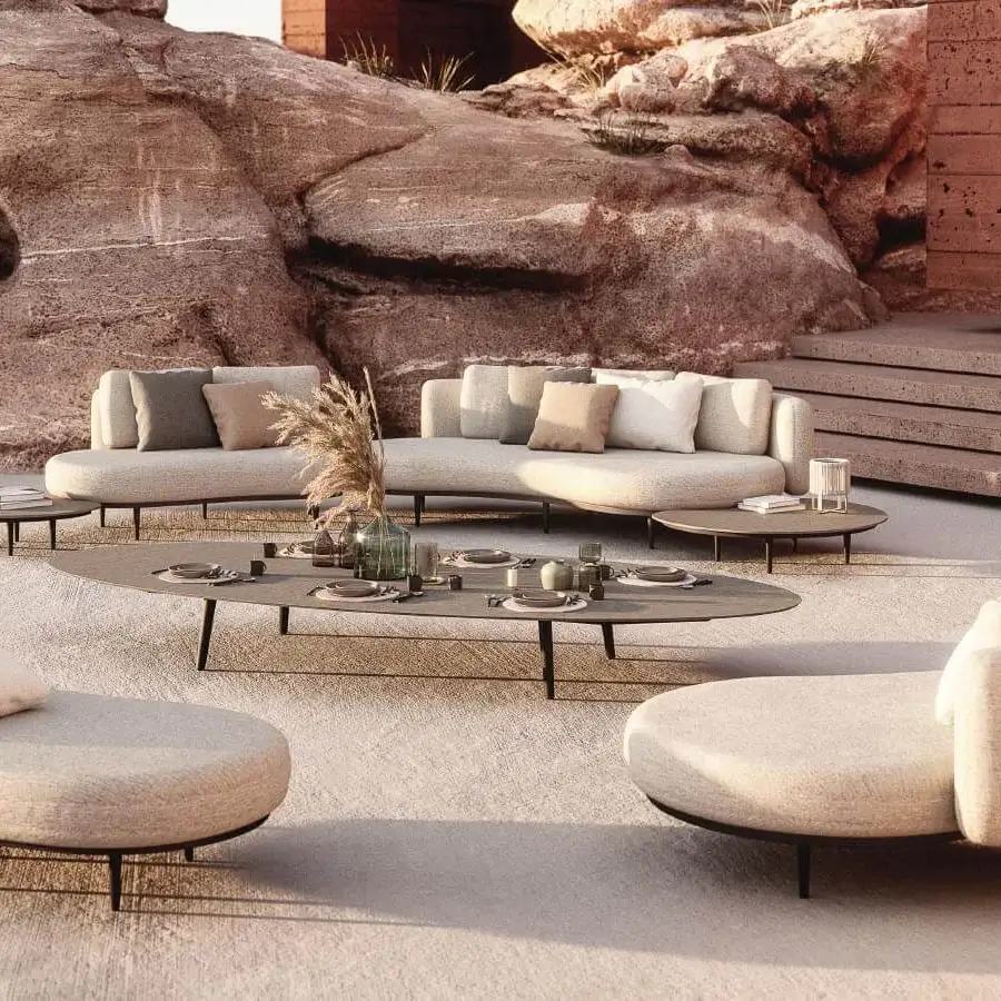 Superior Royal Botania Organix Lounge sectional with organic shapes and a dark aluminum base upholstered in beige cushions