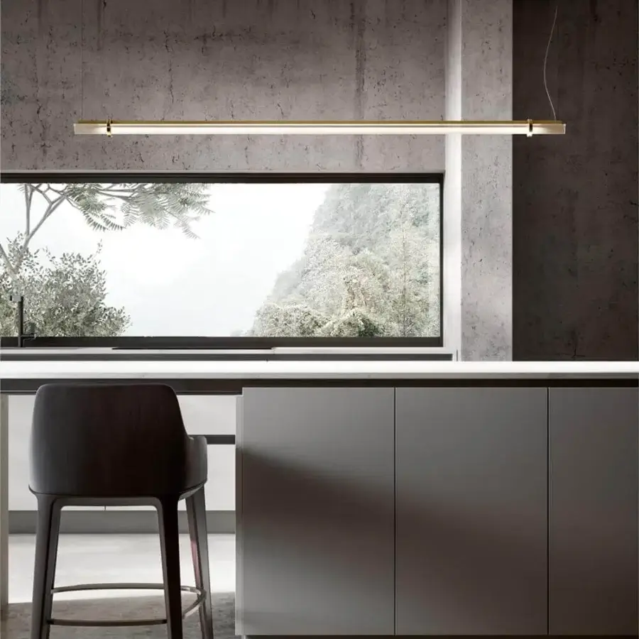 Elegant VENICEM Optical Suspension lamp with natural burnished brass and crystal glass trihedron diffuser crafted for contemporary spaces