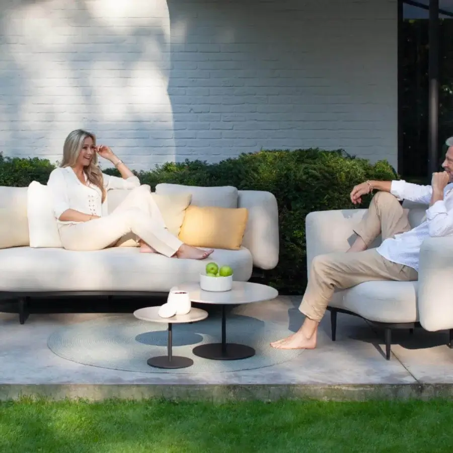 Exceptional Royal Botania Organix lounge chair crafted with neutral matte textile and dark metal legs