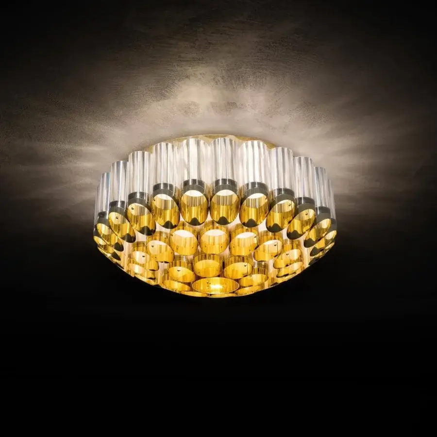 Superior Slamp Odeon ceiling lamp in concentric crowns of metallic Lentiflex and Goldflex, a glasslike technopolymer with radiant gold interior