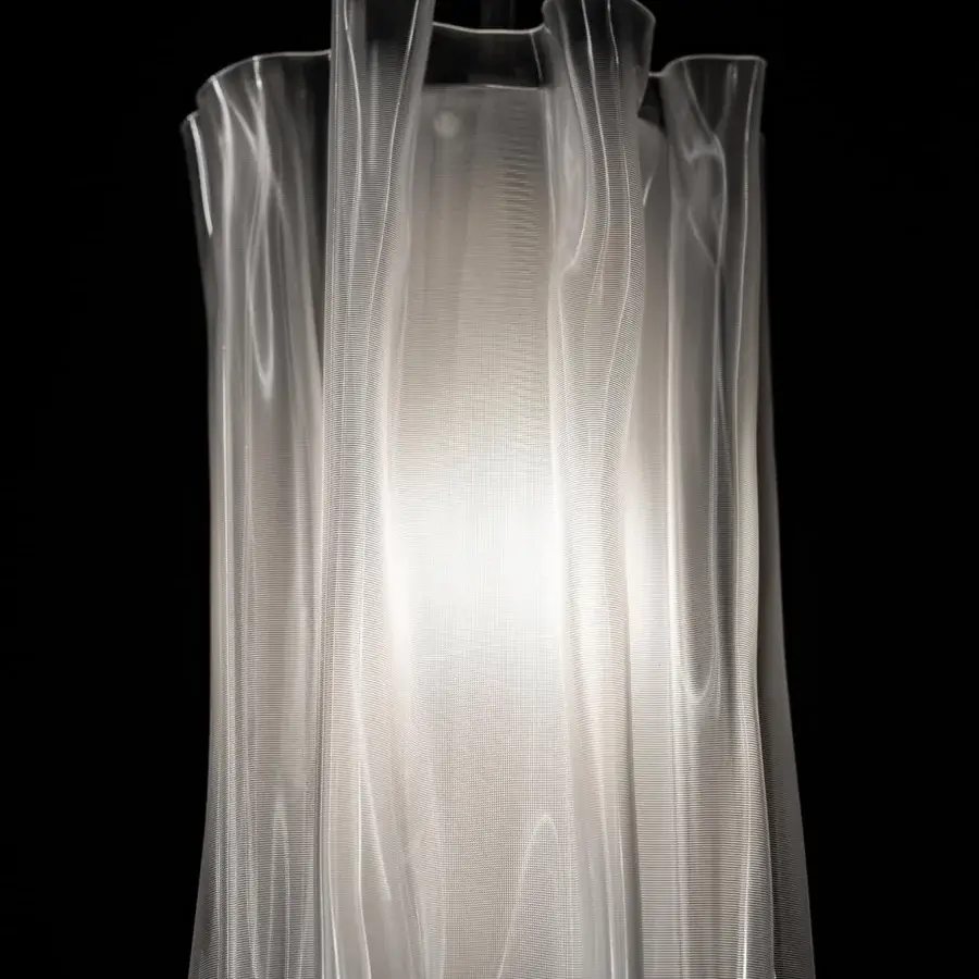 Distinguished Slamp Accordéon suspension lamp with translucent material and vertical lines in a prisma finish showcasing white tones