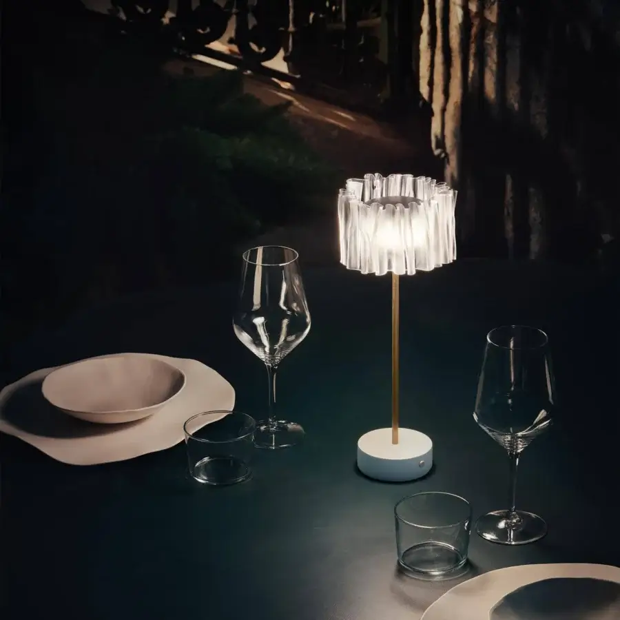 Elegant Slamp Accordéon battery lamp with transparent shade and satin white finish in anodized aluminum