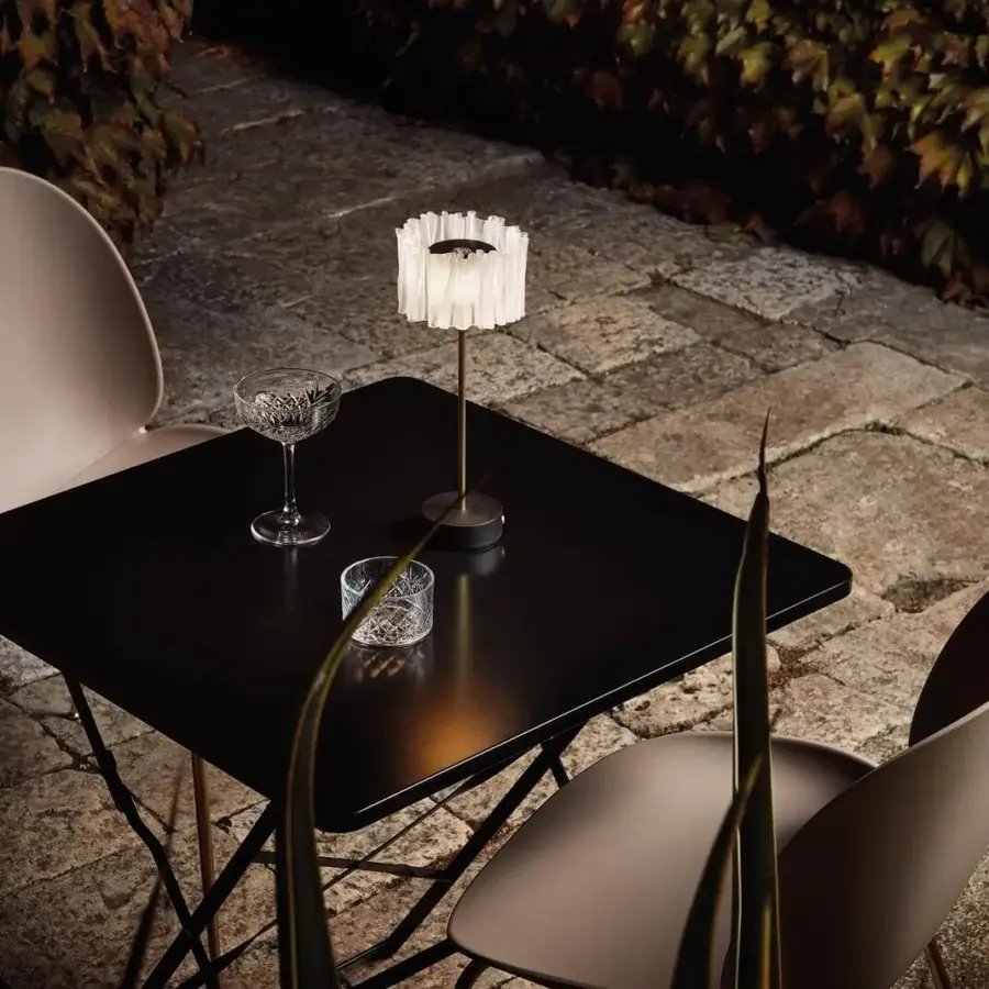 Distinguished Slamp Accordéon battery lamp with transparent satin white shade and semi-matt satin anodized aluminum stand crafted with a black base