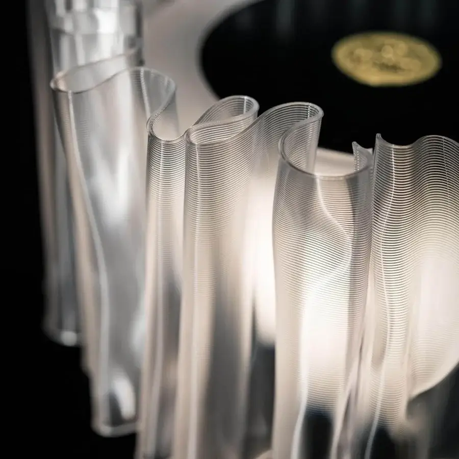 Elegant Slamp Accordéon battery lamp with undulating translucent fins in satin white and anodized aluminum
