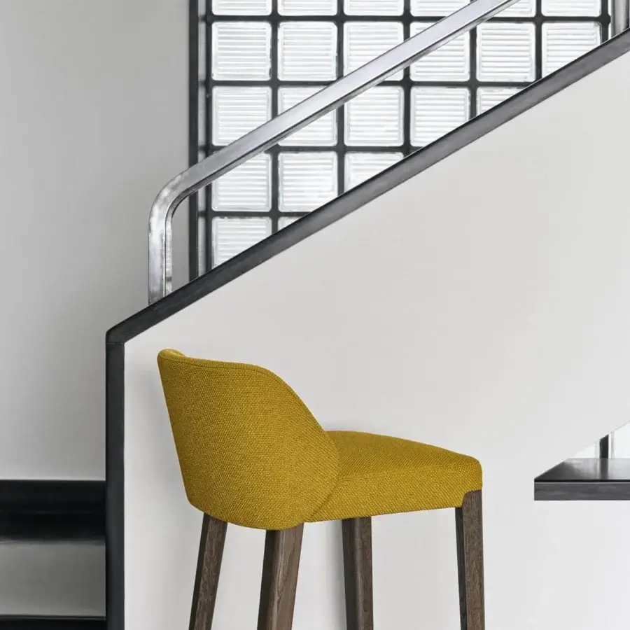 Distinctive Potocco Concha stool with enveloping mustard textile upholstery and dark-stained solid oak legs