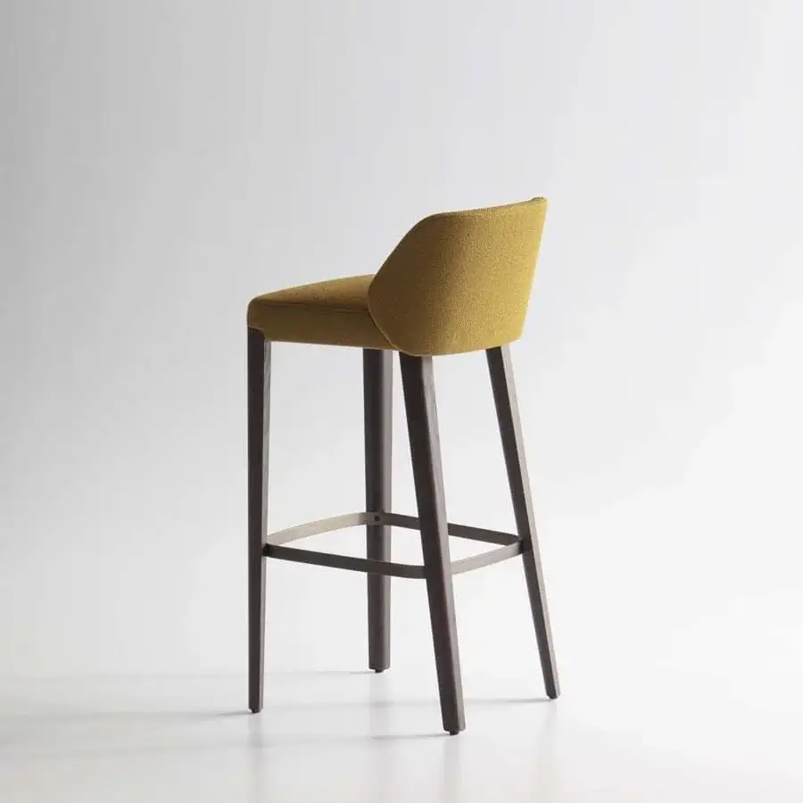 Distinguished Potocco Concha stool with textured yellow-gold upholstery and dark-toned solid oak legs crafted in Italy