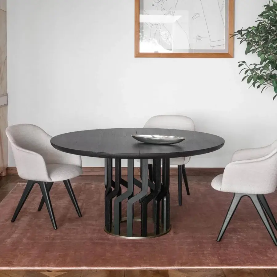 Distinguished Potocco Intreccio table built with a circular top and fourteen shaped solid ash wood elements in a dark finish