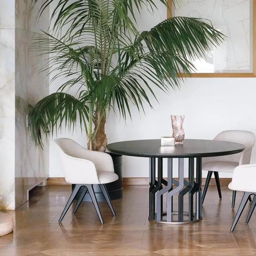 Elegant Potocco Intreccio table with a circular top and fourteen shaped solid ash wood elements in a dark finish