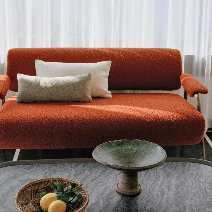 Exclusive Potocco Spring coffee table with a refined oval silhouette and dark textured top in ash wood