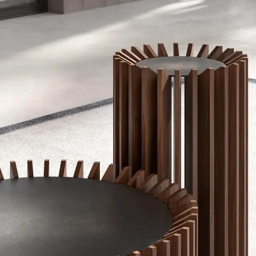 Innovative VENICEM Blade coffee table with warm brown canaletto walnut blades and burnished brass tabletop