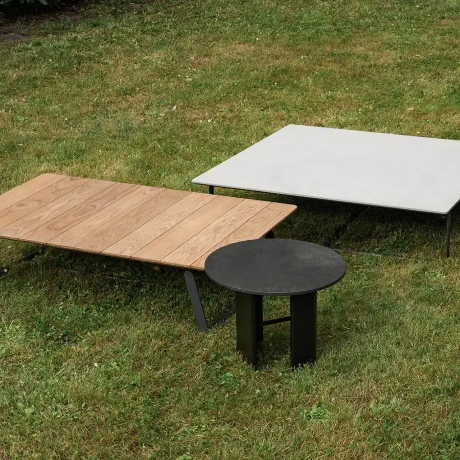 Distinguished Potocco Double L side table with black laminated porcelain and embossed steel in ossido finish
