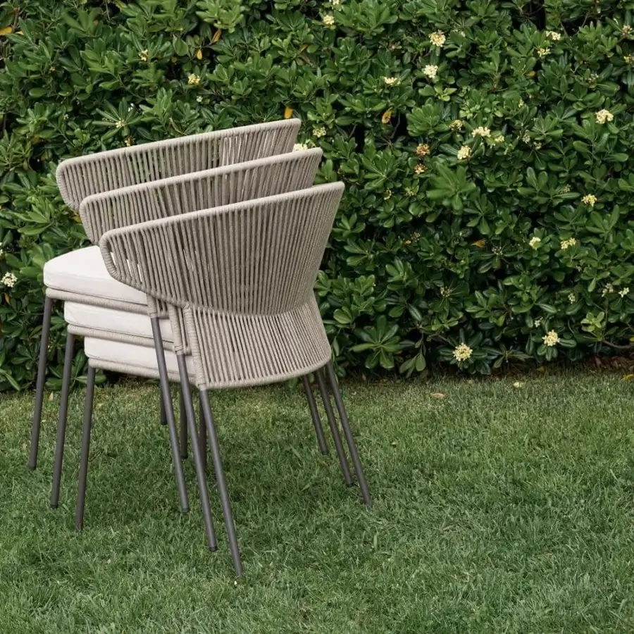 Distinguished Potocco Ola armchair with a hand-woven Fly ribbon backrest and sleek metal legs with a matte finish