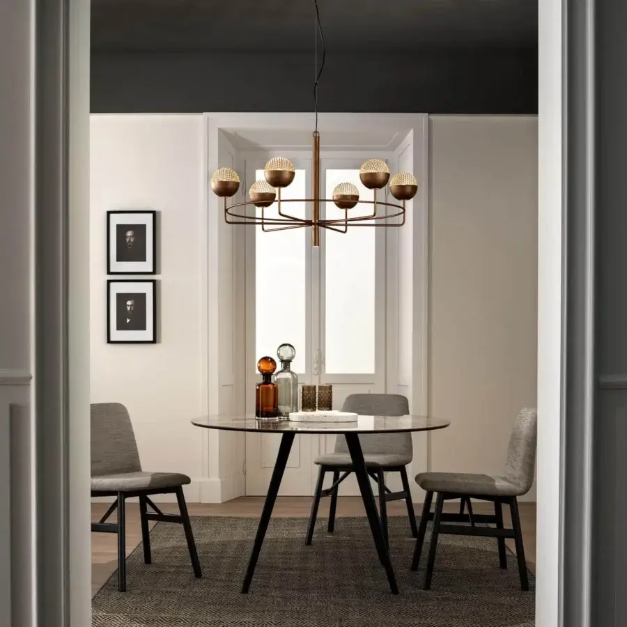 Superior Masiero Iglù chandelier with a brushed patina metal structure and spherical shades in warm bronze or copper tones