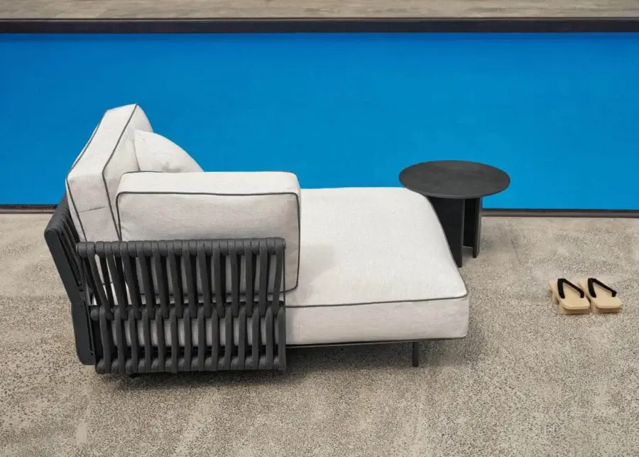 Superior Potocco Soul lounger, outdoor seating with interwoven backrest and dark woven frame supporting light grey cushions
