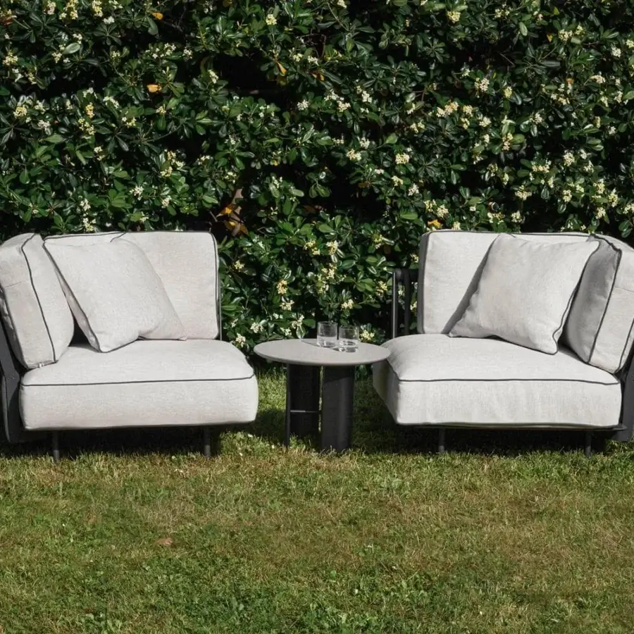 Distinguished Potocco Soul lounge chair with an interweaving backrest and dark-toned platform built with metal and light-colored cushions