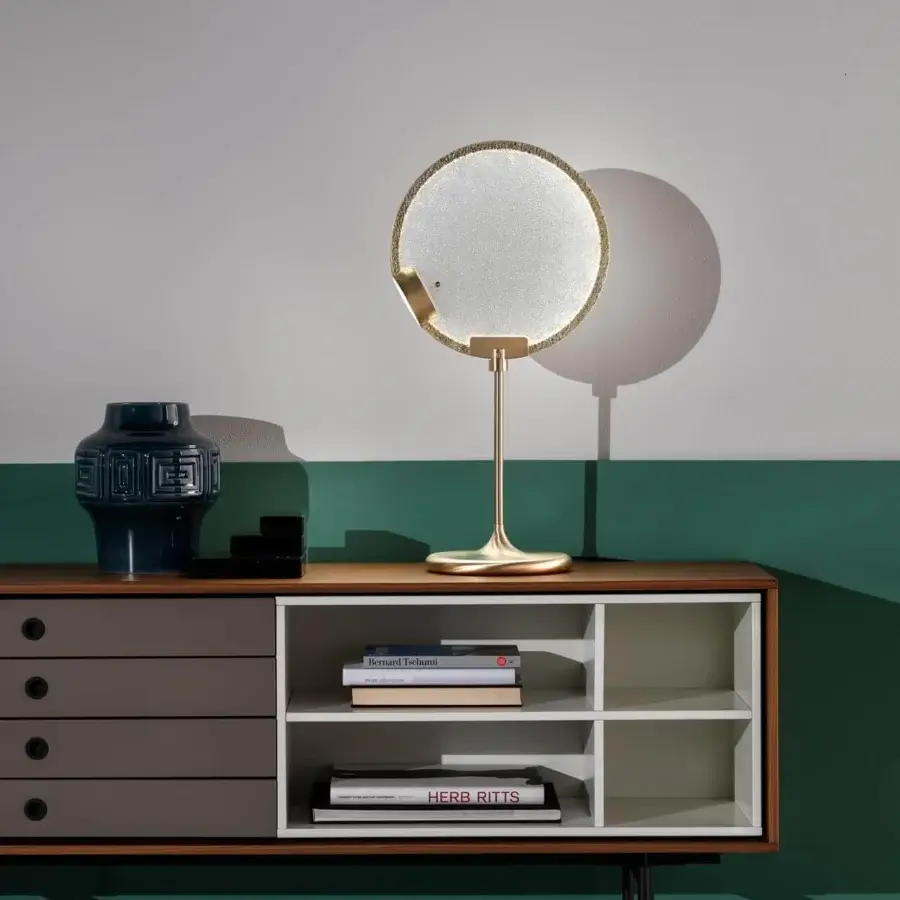 Elegant Masiero Horo table lamp with circular form in metal and frosted glass with glossy finish