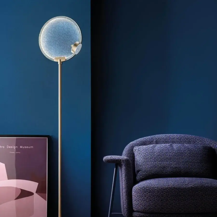 Elegant Masiero Horo floor lamp with metal structure and refined glass diffuser in warm metallic gold finish