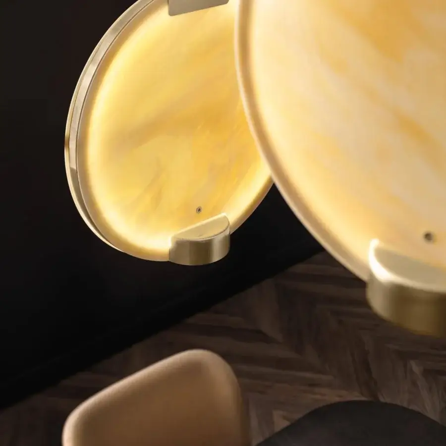 Superior Masiero Horo suspension lamp with swirling yellow and white patterned glass in a brushed metal frame