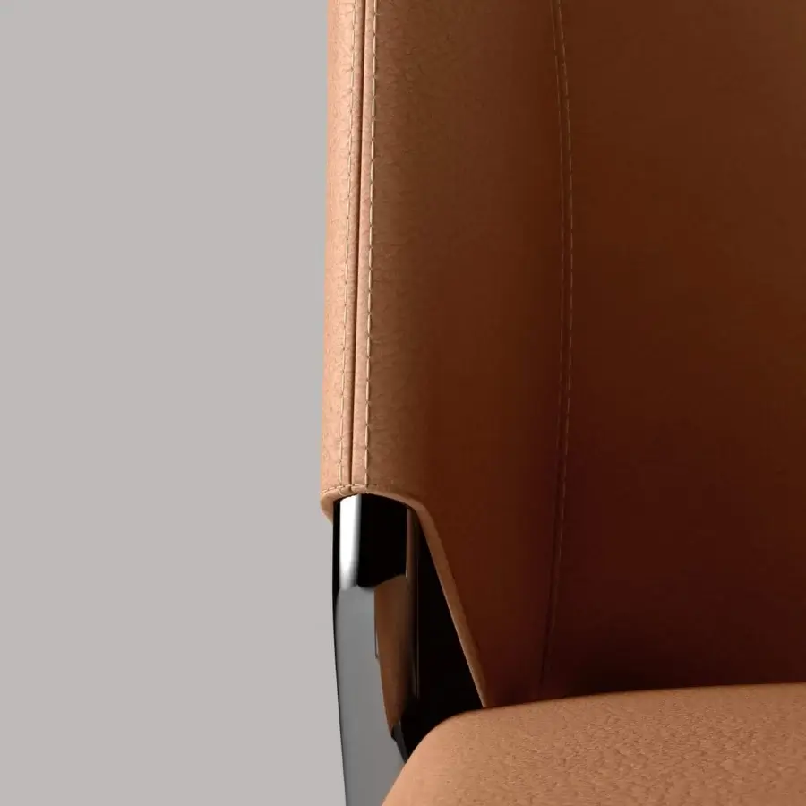 Distinguished Tonelli Design She chair with tan leather-like upholstery and glossy metal frame