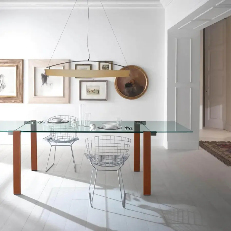 Exceptional Tonelli Design Livingstone table with transparent glass top and medium-brown wooden legs crafted with an innovative opening mechanism