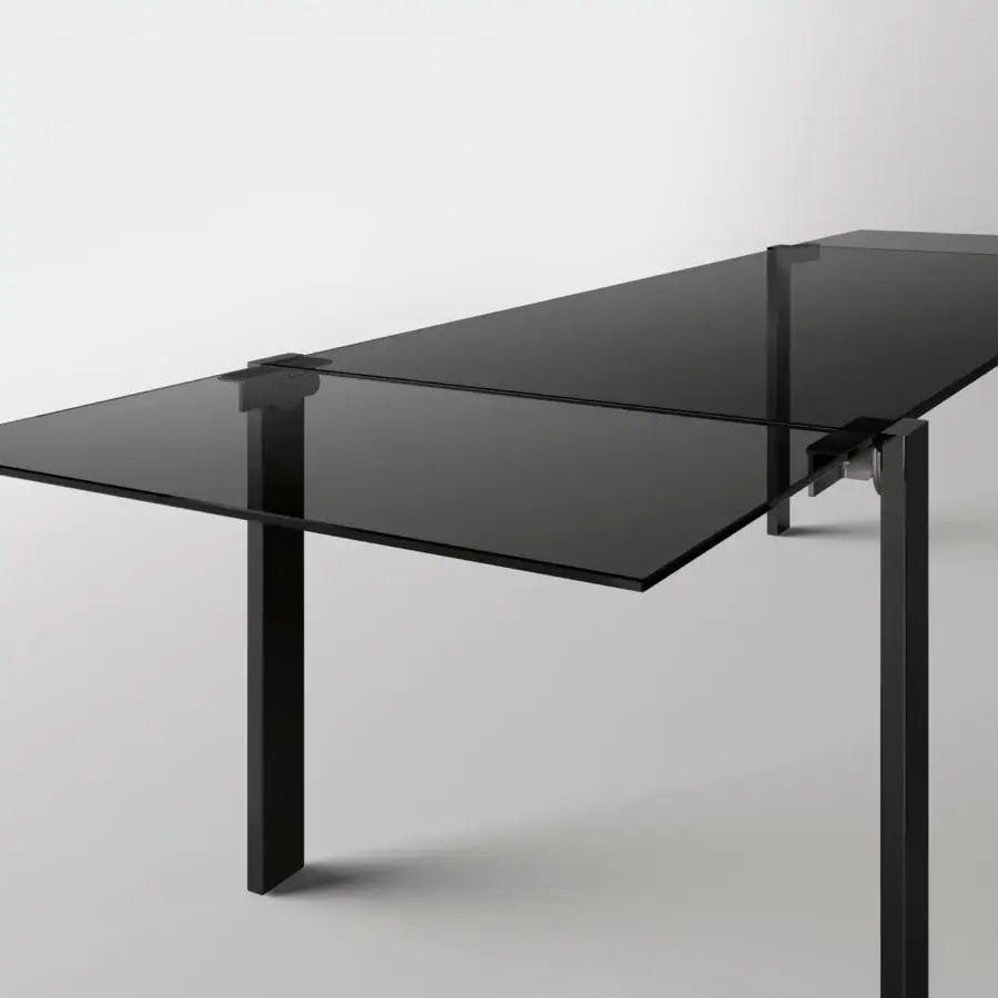 Innovative Tonelli Design Livingstone table with glossy black glass top and matching metal frame built with a flapping mechanism