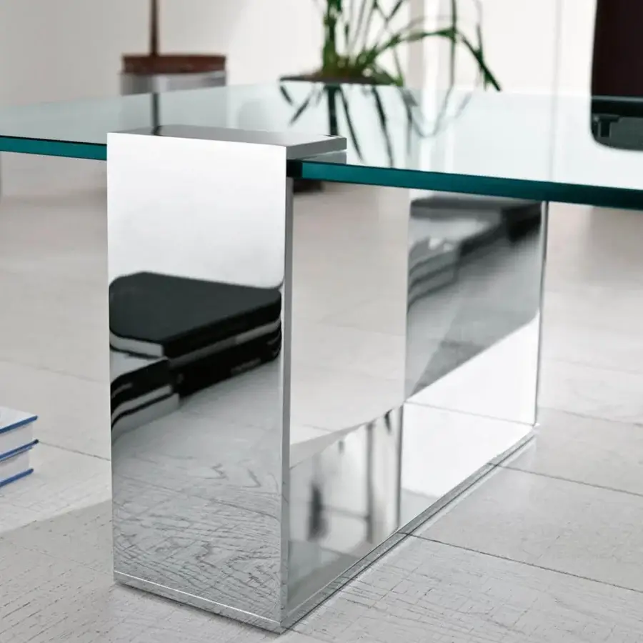 Distinguished Tonelli Design Plinsky coffee table with tempered glass and polished metal base crafted in a curving U-shaped design