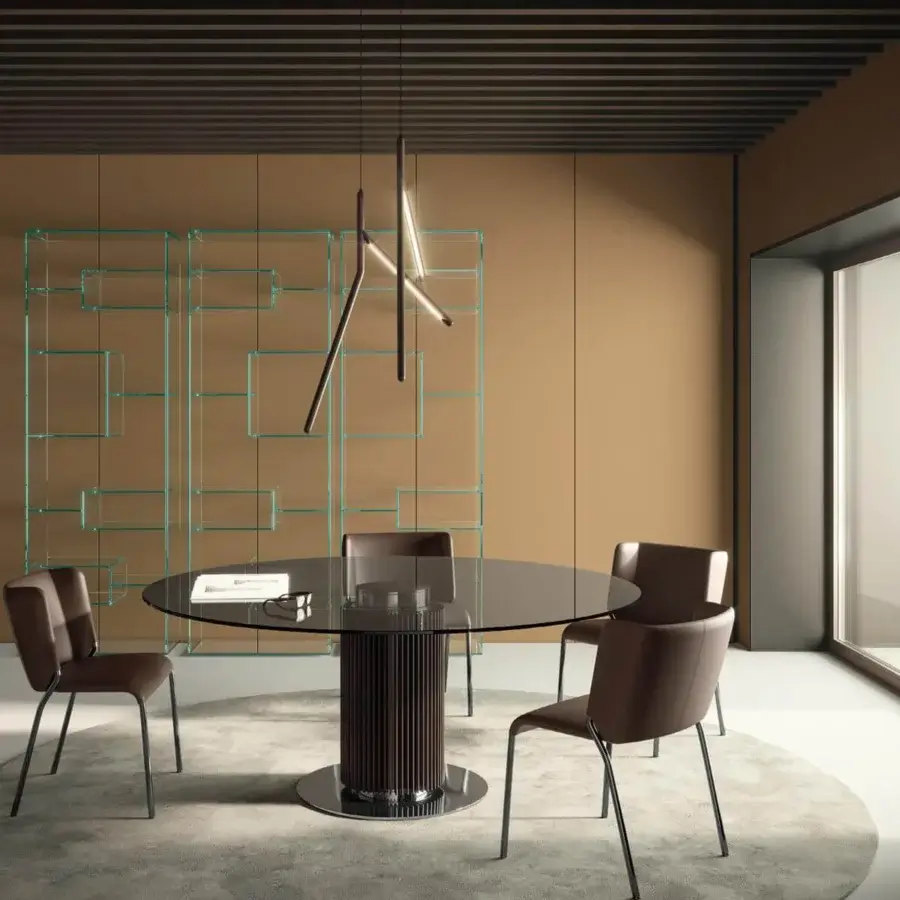 Distinguished Tonelli Design Hybrid table with dark-tinted glass and a rhythmic wood-like slat base supported by a metallic plinth