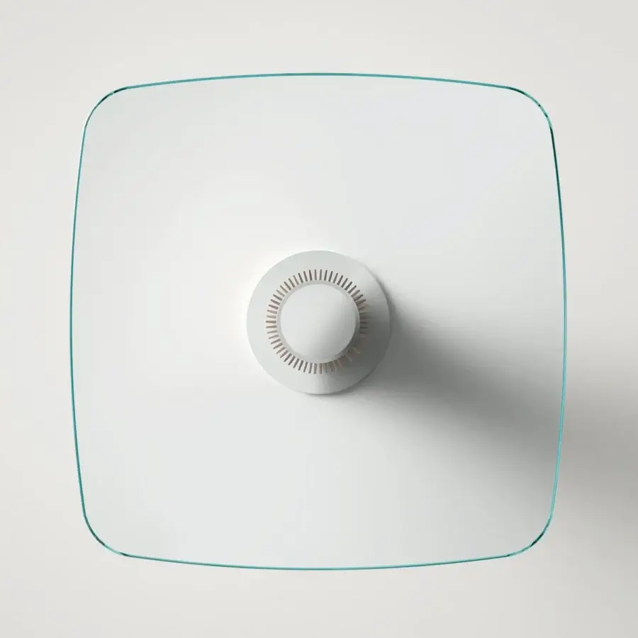 Distinguished Tonelli Design Hybrid table with a cylindrical white base and square glass top in a subtle turquoise tint