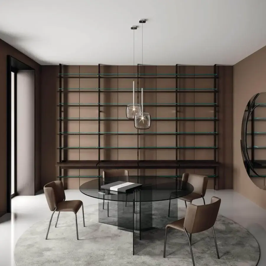 Distinguished Tonelli Design Thrim table with a round glass top and uniquely angled dark-toned base representing Italian glass manufacturing