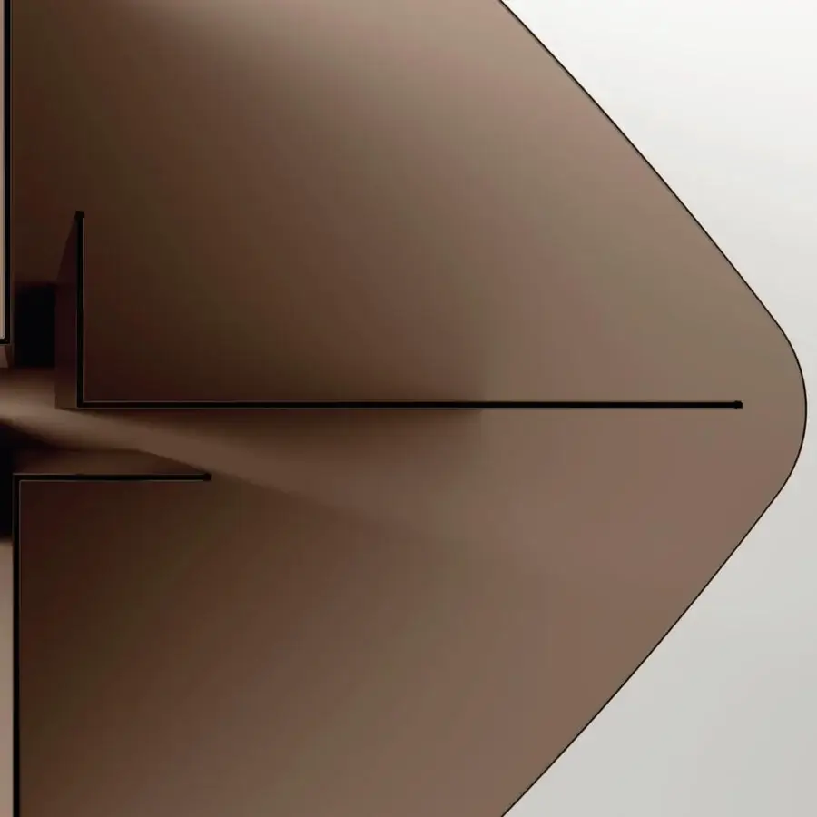 Innovative Tonelli Design Thrim table with intersecting matte glass planes and asymmetrical geometric silhouette