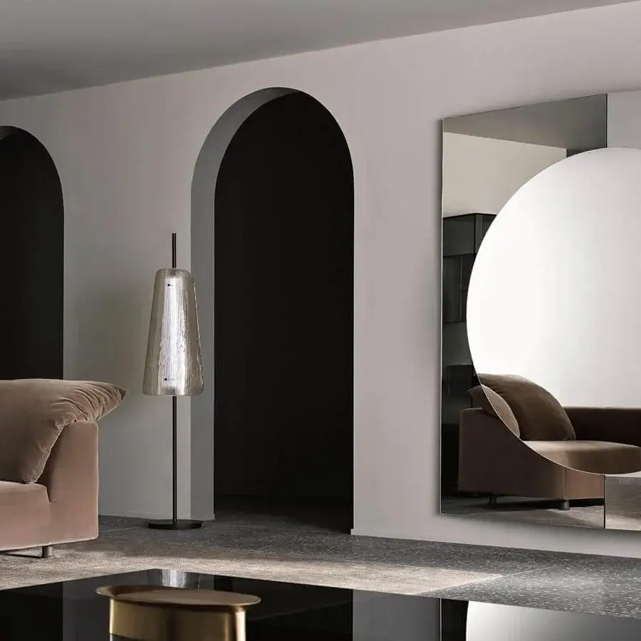 Distinguished Tonelli Design Central mirror crafted in Italy with a dark frame and circular glass cut-out for innovative interiors